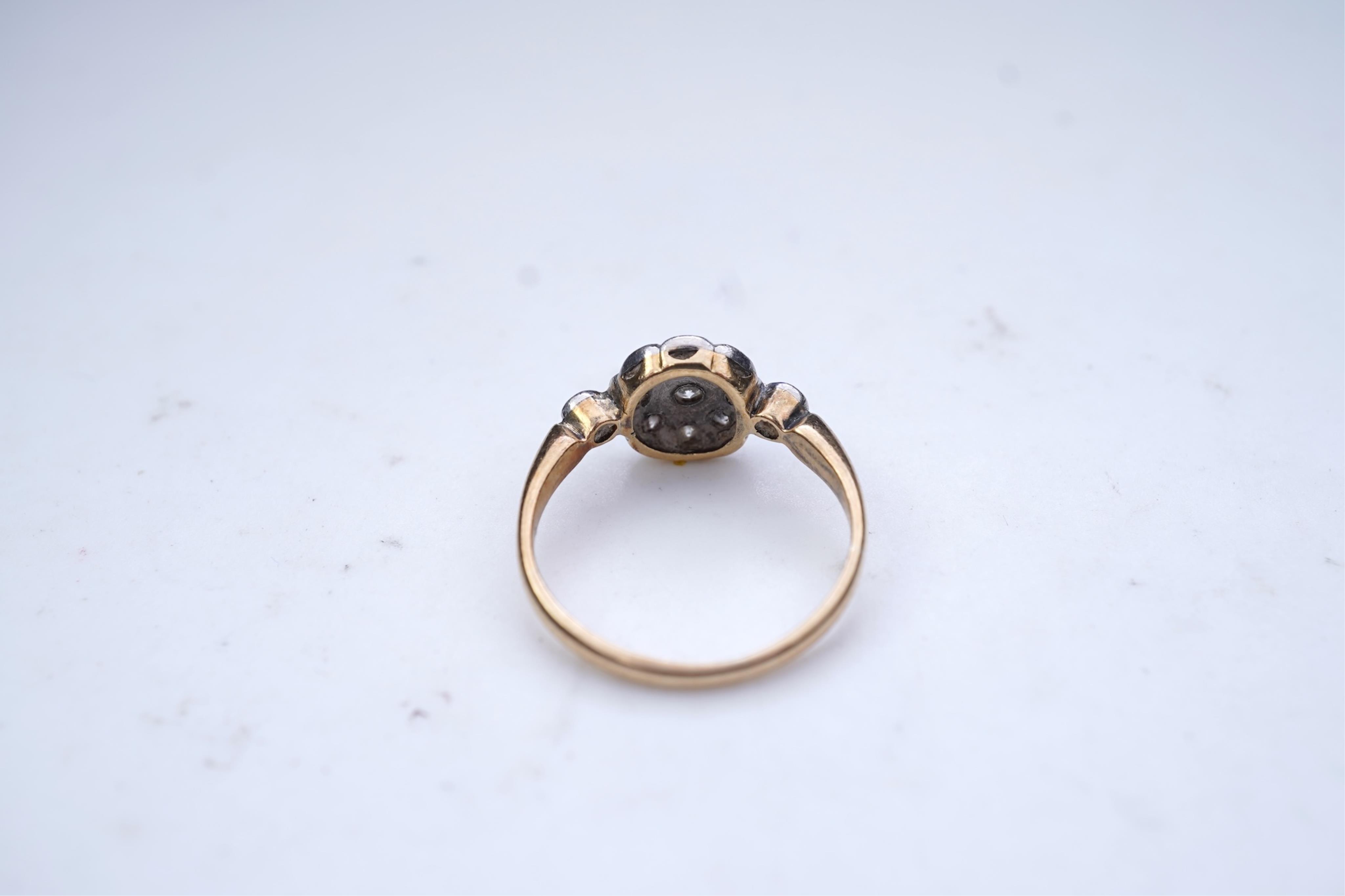 A diamond cluster ring, early 20th century